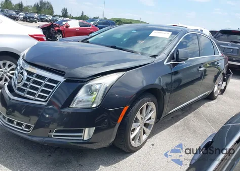 2014 Cadillac Xts Luxury from USA, damaged, VIN 2G61M5S39E9221111